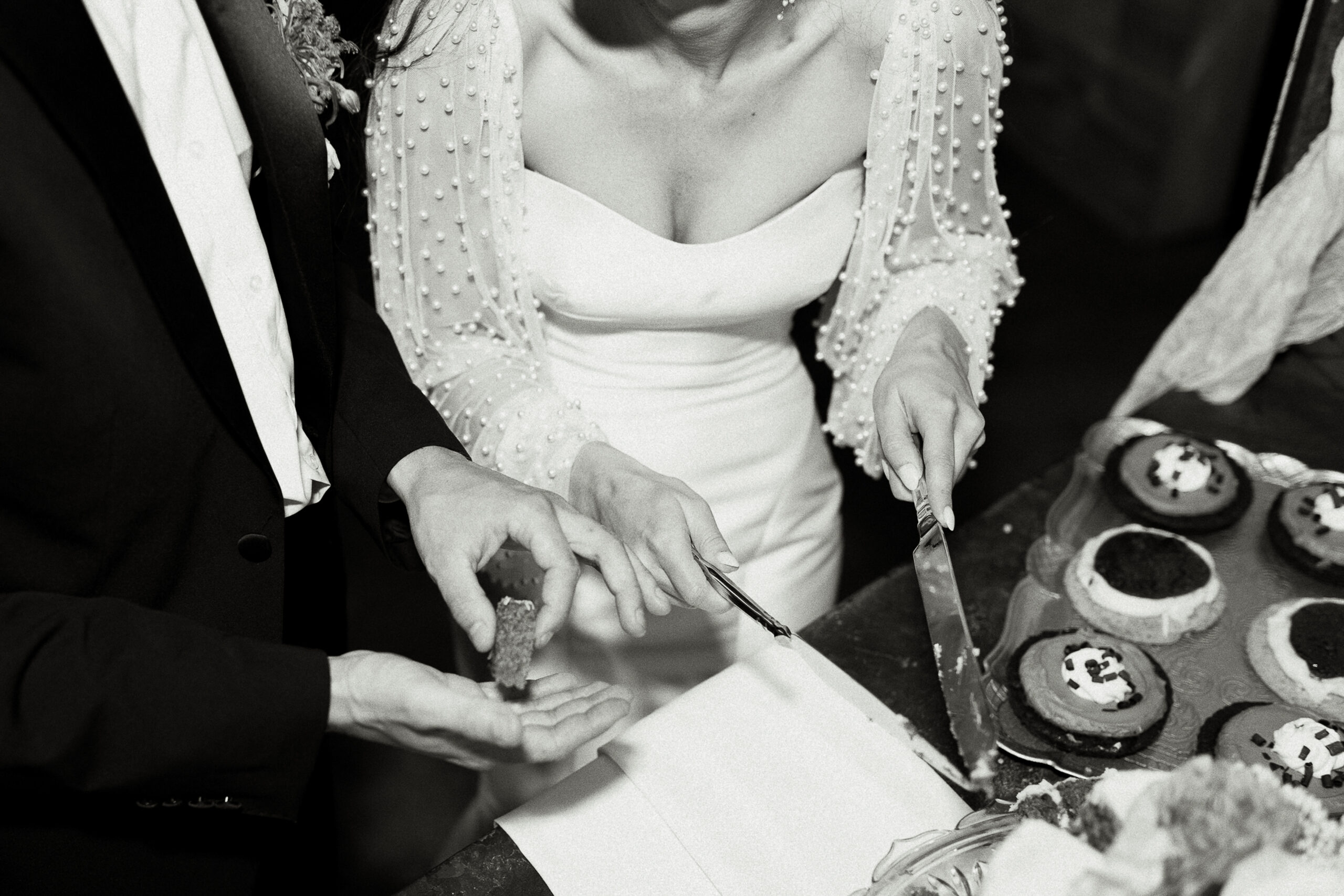 Bride holding a white calla lily bouquet before her destination wedding ceremony abroad