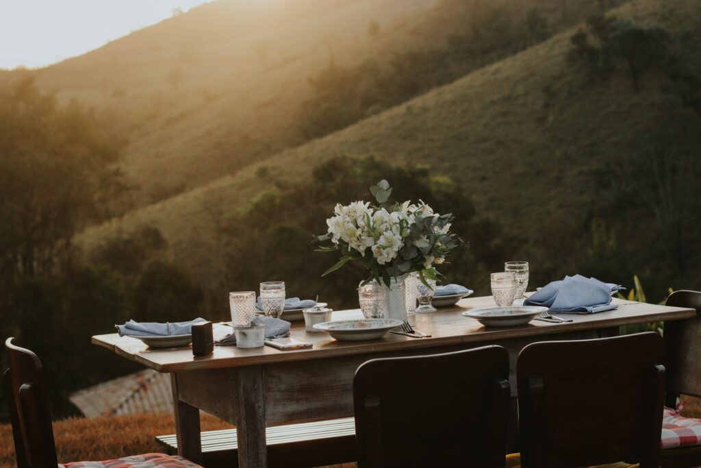Private chef dinner table set outdoors at sunset